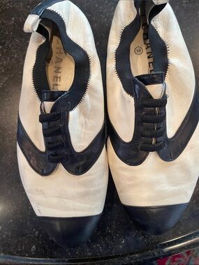CHANEL White and Black Leather Slip-On Loafers